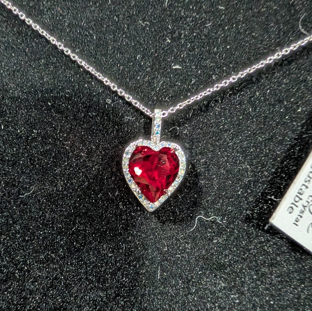 Elegant Silver Heart Necklace with Red Gemstone